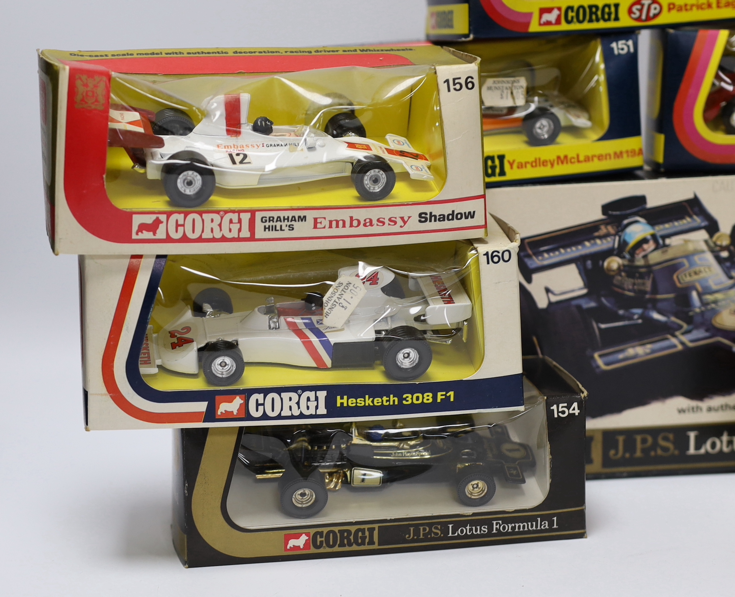 Ten boxed Corgi racing cars